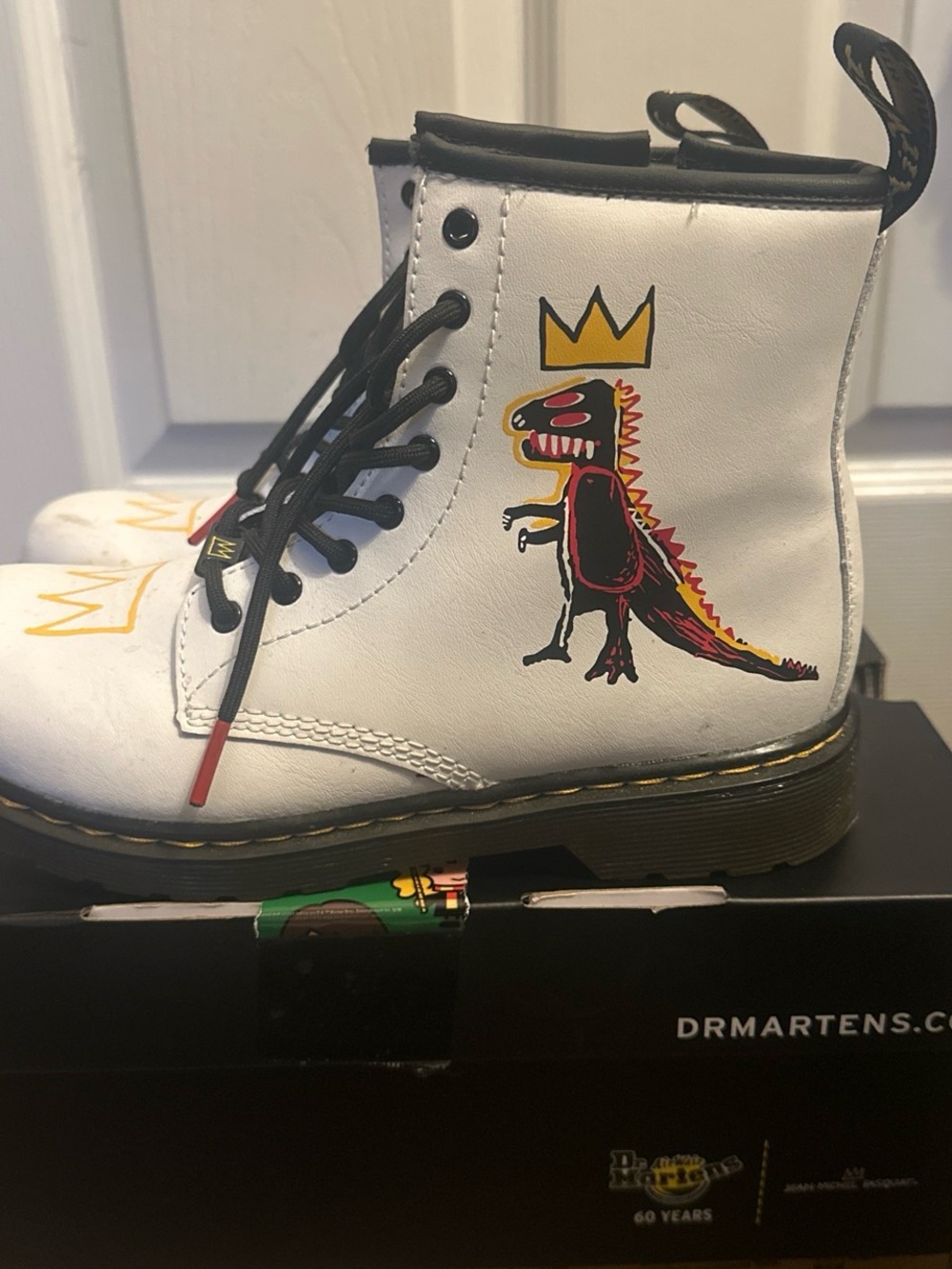 Dr. Martens x Basquiat Kids White Dino Graphic Lace-Up Boots with Black Trim